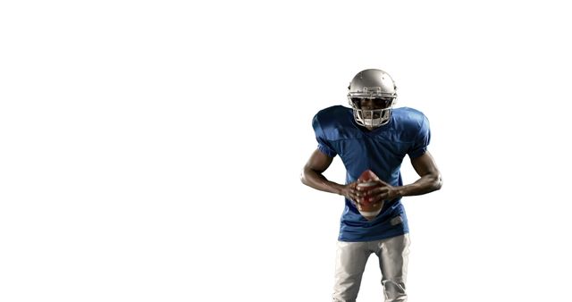 American football player in blue uniform holding ball isolated on white - Download Free Stock Images Pikwizard.com