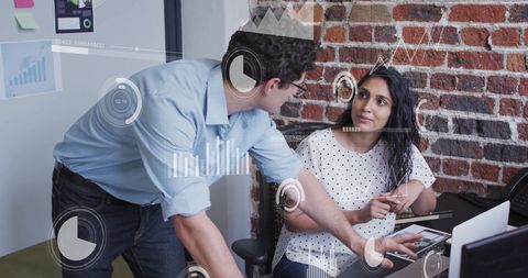 Collaborative Business Team Analyzing Data in Modern Office