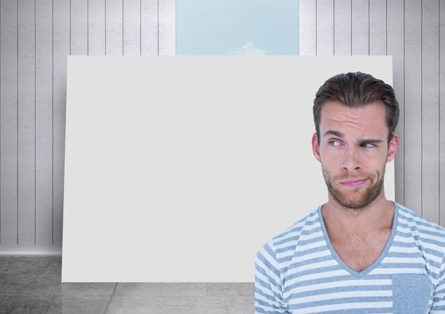 Digital composite of Man thinking against blank card in room and sky background