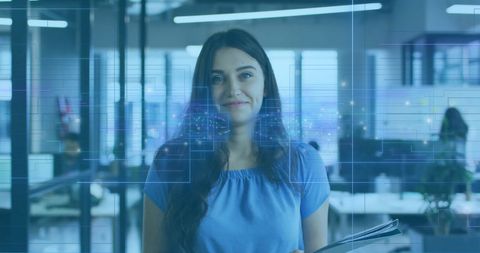 Woman Analyzing Digital Data in Modern Office Setting