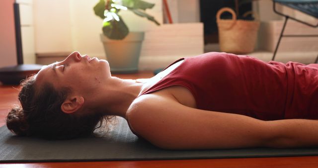 Woman Practicing Relaxation Yoga Pose at Home on Mat - Download Free Stock Images Pikwizard.com