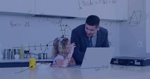 Businessman in suit teaching daughter math at breakfast using laptop explaining graphs and formulas