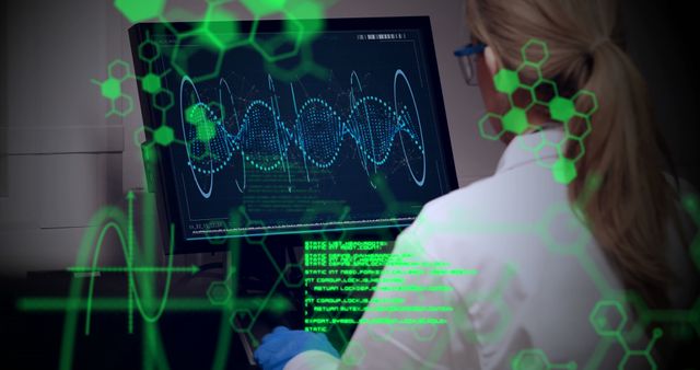 Scientist Analyzing DNA Data on High-Tech Monitor with Futuristic Graphics - Download Free Stock Images Pikwizard.com