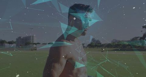 Male Athlete with Abstract Geometric Overlay on Sports Field