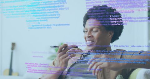 smiling developer on smartphone analyzing code - Download Free Stock Images Pikwizard.com