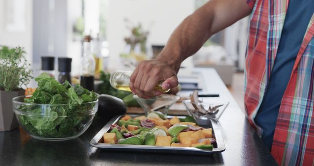 Person Preparing Fresh Vegetable and Fruit Salad in Modern Kitchen - Download Free Stock Images Pikwizard.com