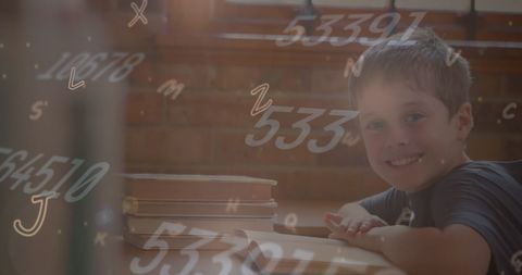 smiling boy in classroom surrounded by floating numbers - Download Free Stock Images Pikwizard.com