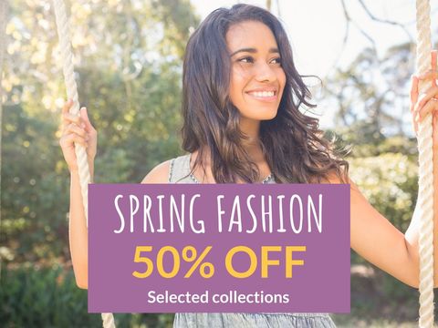 Joyful woman on swing promoting spring fashion sale