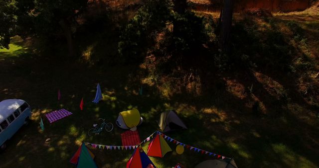 Aerial View of Colorful Tents in Forested Campsite - Download Free Stock Images Pikwizard.com