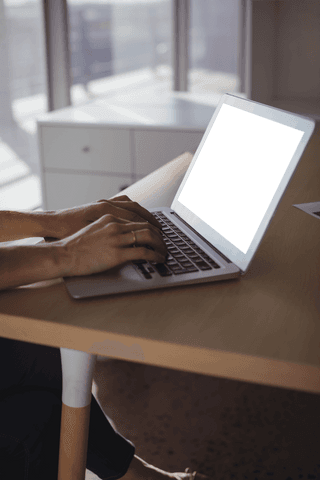woman's hands typing on laptop with transparent screen - Download Free Stock Videos Pikwizard.com