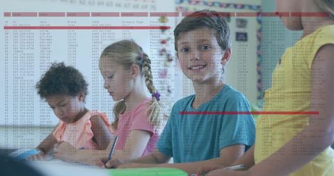 Smiling boy writing worksheet in classroom with data overlay conveying digital privacy