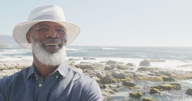 Happy Mature Man Enjoying Coastal View on Sunny Day - Download Free Stock Images Pikwizard.com