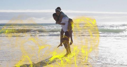 Playful Piggyback Ride at Sunny Beach with Coastal Background