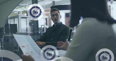 Executives in Modern Office Analyzing Data Projections