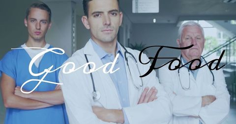 Confident Medical Team Standing in Hospital Corridor