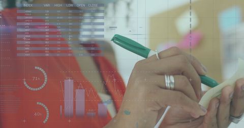 Caucasian businesswoman using smartphone with digital data overlay