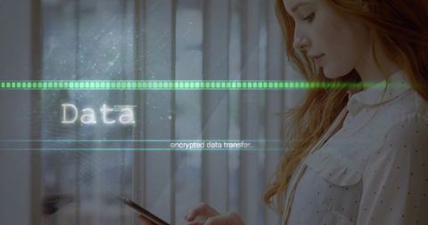 Redhead woman holding smartphone with encrypted data hud overlay and green progress bar
