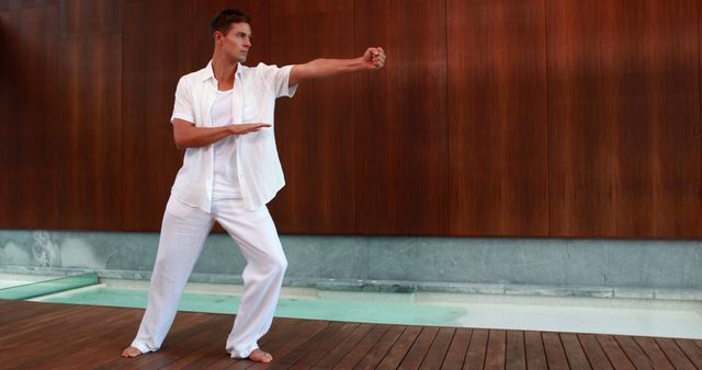 Man Practicing Tai Chi in Tranquil Outdoor Space - Download Free Stock Images Pikwizard.com