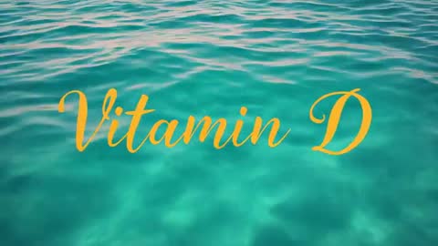 Sunlit turquoise sea showing Vitamin D script overlay shimmering across rippling water