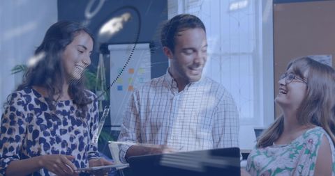 Diverse Team Engaging in Data Processing and Analysis in Office Environment