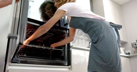 Mother Baking Time: Bonding in Modern Kitchen - Download Free Stock Images Pikwizard.com