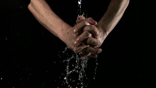 Shot of hands under flowing water, suggesting health and cleanliness themes. Suitable for use in awareness campaigns, educational materials, and healthcare advertisements focusing on sanitation and hygiene practices.