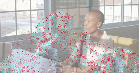 Sunlit modern loft meeting with woman with cropped hair talking and collaborating in urban workspace