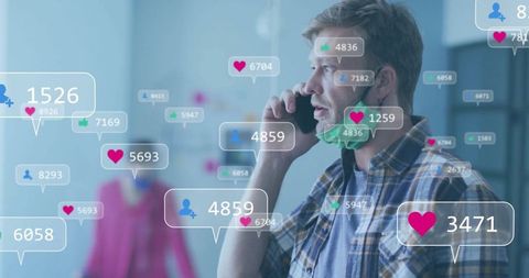 Man Communicating While Icons Display Social Media Engagement