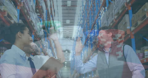 Warehouse Team Collaborating Globally Among Data Visuals