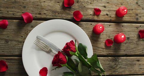 Romantic Valentine's Day Setting with Roses and Candles - Download Free Stock Images Pikwizard.com