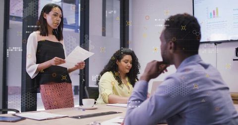 Professional team collaborating in modern startup office