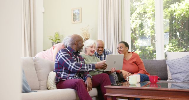 Happy Multi-ethnic Seniors Connecting Online with Laptop at Home - Download Free Stock Images Pikwizard.com