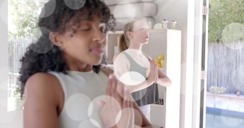 Diverse Teenage Girls Practicing Yoga Meditation with Light Spots