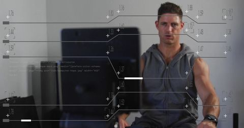Data analysis overlay on man using rower in gym
