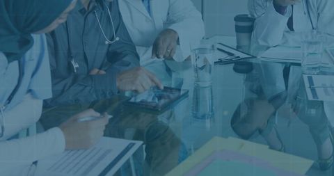 Diverse Medical Team Collaborating with Digital Technology