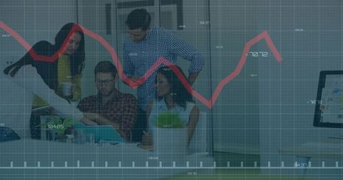 Young professionals analyzing financial chart in office
