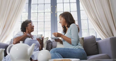 African American Mother and Daughter Enjoying Tea Time - Download Free Stock Images Pikwizard.com