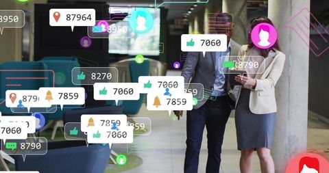 Business professionals walking with mobile notifications and social alerts in office