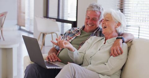 Happy Senior Couple Video Chatting on Laptop at Home - Download Free Stock Images Pikwizard.com