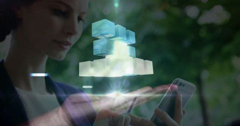 Professional Woman Interacting with Futuristic Holographic Display Outdoors