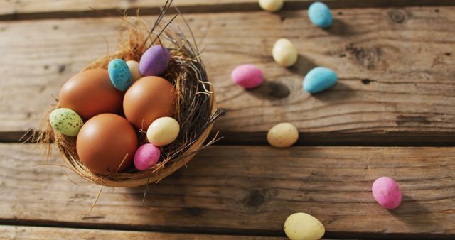 Image of eggs and chocolate eggs on a wooden surface. seasonal easter traditional sweet treats.