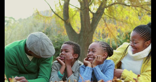 Happy Family Enjoying Autumn Leaves in Park - Download Free Stock Images Pikwizard.com