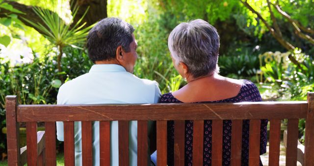 Senior Couple Relaxing on Bench in Sunny Garden - Download Free Stock Images Pikwizard.com