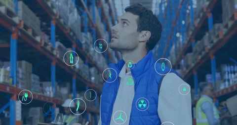 Warehouse Supervisor Inspecting Racking with Augmented Reality Overlay and Clipboard