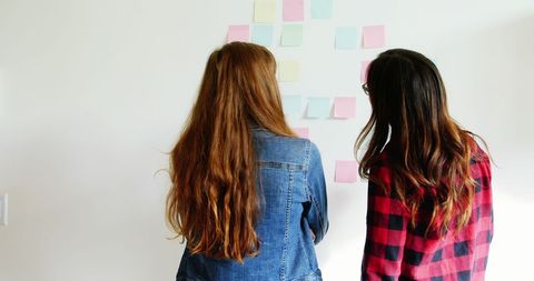 Women Collaborating with Sticky Notes in Office Concept - Download Free Stock Images Pikwizard.com
