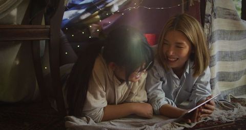 Loving Mother and Daughter Bonding Under DiY Shelter