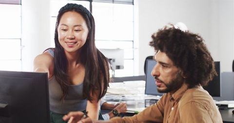 Collaborative teamwork in modern office workspace
