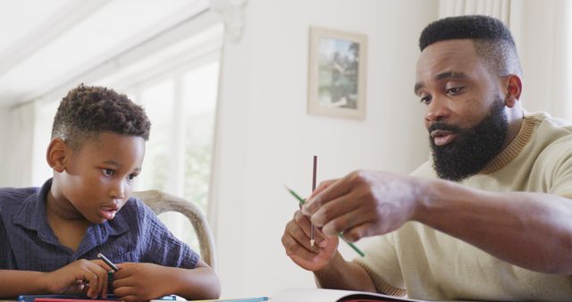 Father Teaching Curious Son at Home, Family Learning Time - Download Free Stock Images Pikwizard.com