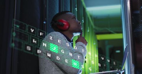 Cybersecurity expert analyzing data in server room