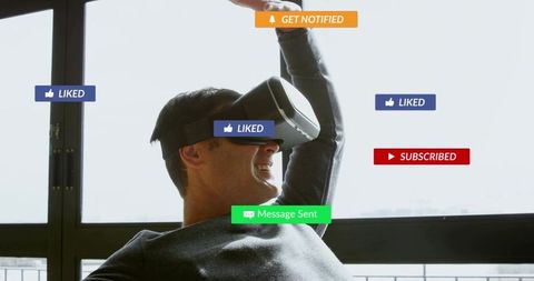 Man experiencing virtual reality with social notifications floating by large window daylight